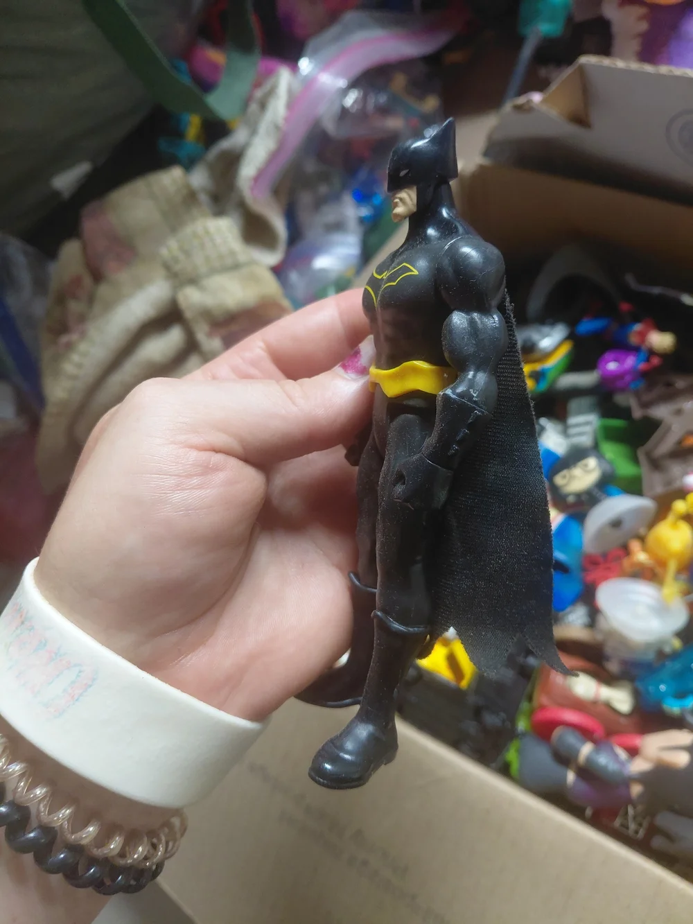 6-inch Mattel Justice League Batman action figure, recognized by its bright yell